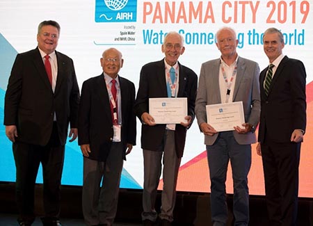 Arthur Mynett together with Angelos Findikakis and Young Kim being awarded the IAHR Honorary Membership by Peter Goodwin and Carlos Vargas